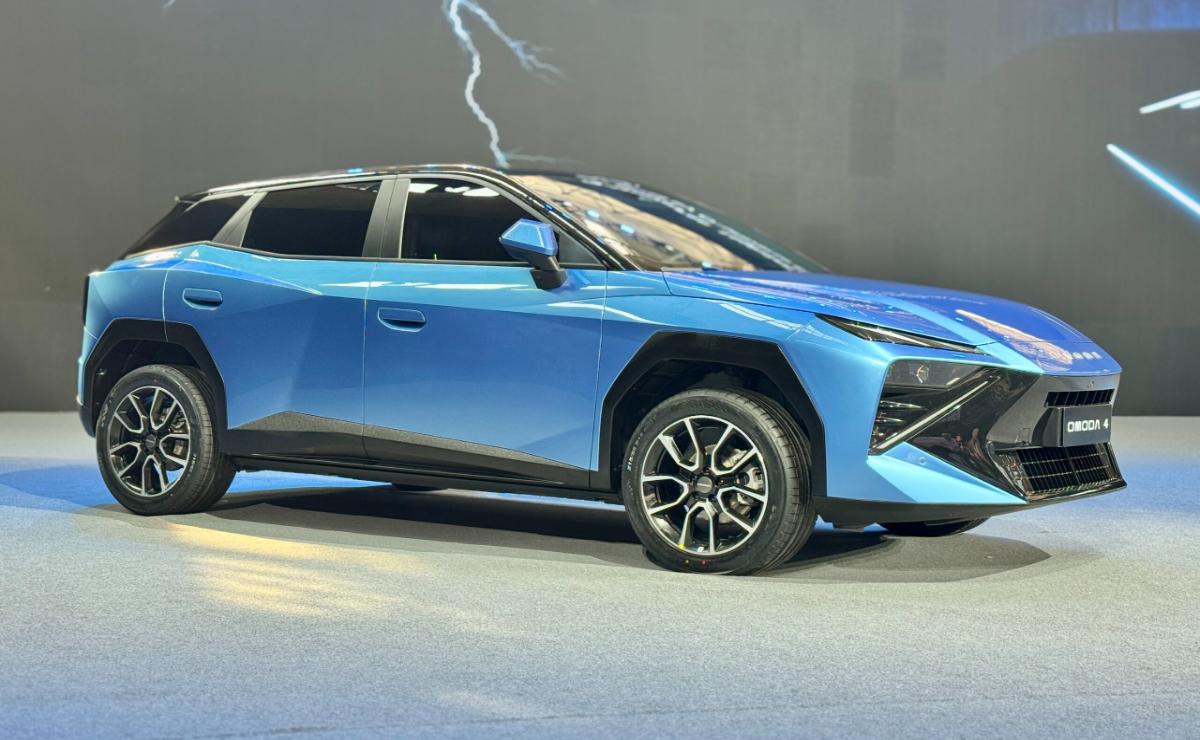 Blue futuristic electric car with sleek design and lightning background.