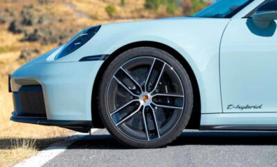 Close-up of a Porsche car wheel with stylish alloy rim.