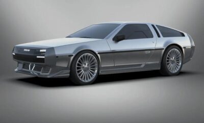 A sleek, modern silver sedan with tinted windows and stylish rims.
