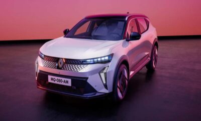 Modern white electric SUV under pink and purple lighting.