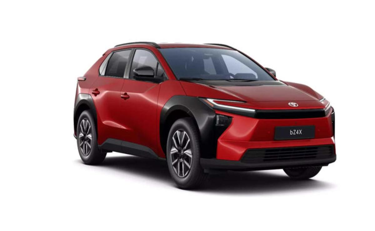 Red and black modern electric SUV car shown from the front side.