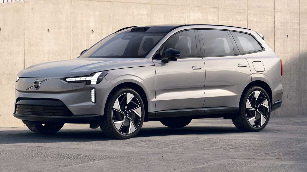 Sleek silver electric SUV with modern design and aerodynamic features.