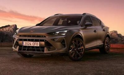 A sleek brown SUV parked at sunset with a stylish design.