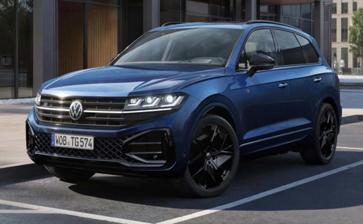 A sleek blue Volkswagen SUV parked outdoors.