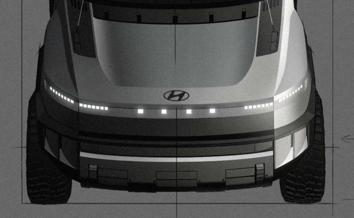 Front view of a Hyundai vehicle illuminated by LED lights at night.
