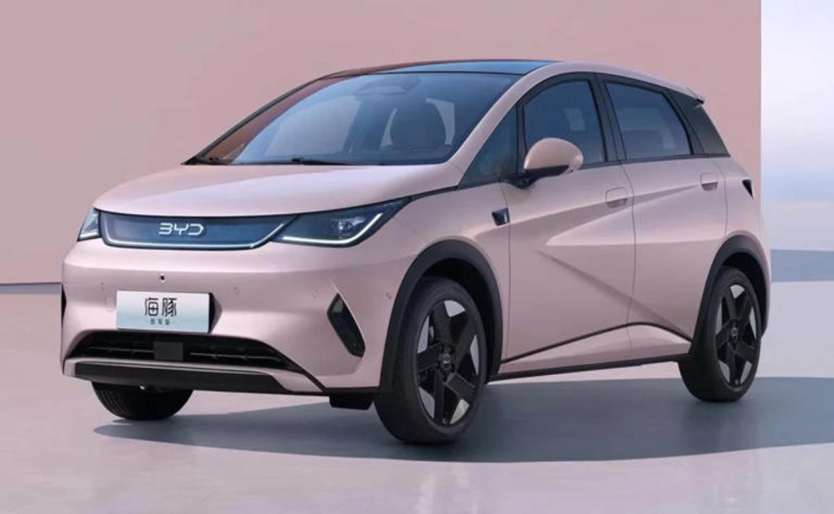 Sleek silver electric car with modern design and aerodynamic features.