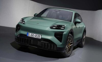 Sleek green electric car with futuristic design and aerodynamic features.