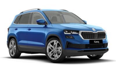 Blue luxury SUV with sleek design and large alloy wheels.