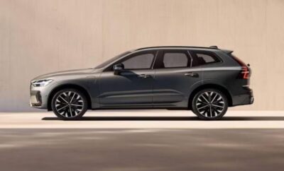 Sleek black luxury SUV parked indoors with modern design.