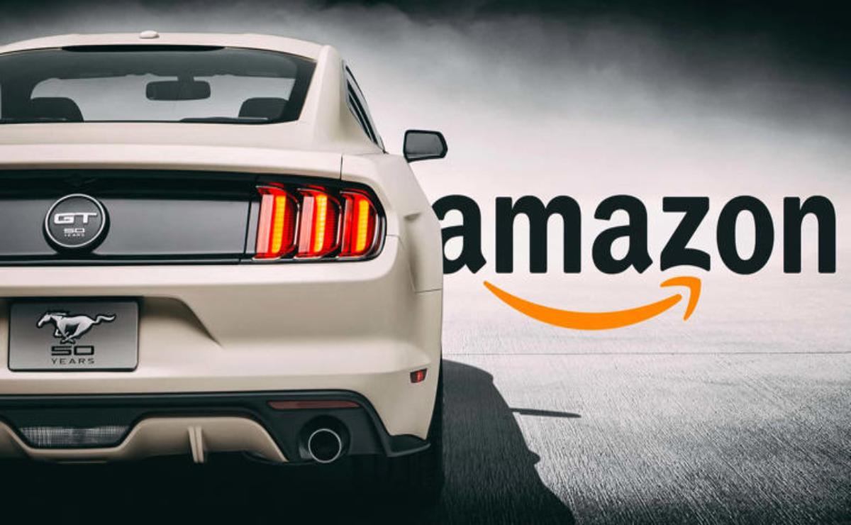 Rear view of a white sports car with Amazon logo in the background.