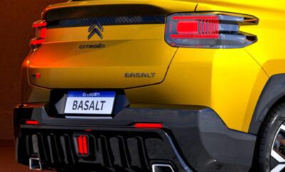 Rear view of a yellow Citroën SUV with Basalt license plate.