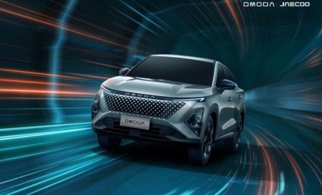 Sleek futuristic electric SUV driving through a dynamic tunnel.