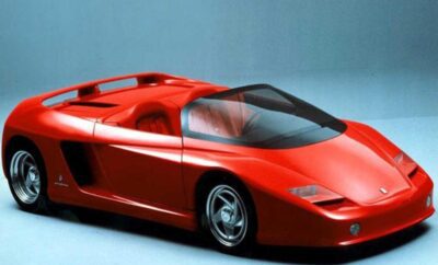 Classic red sports car with sleek design and open roof.