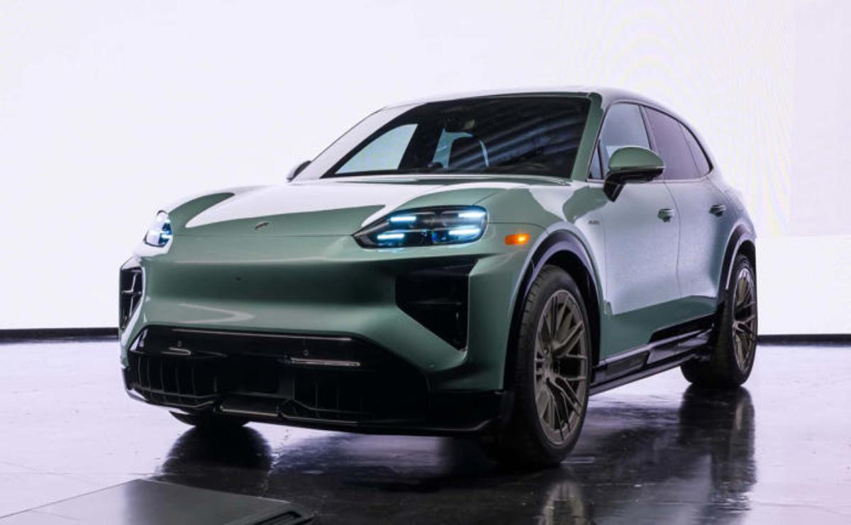 Sleek silver electric SUV with modern LED headlights on display.