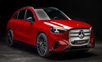 Sleek red luxury SUV with modern design and black accents.