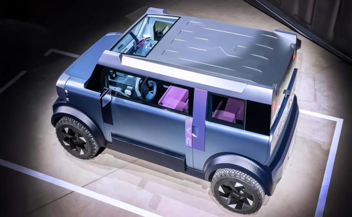 Futuristic compact electric SUV with sleek design and panoramic roof.