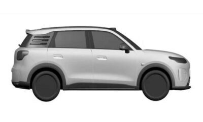 Side view of a modern silver SUV with black wheels and tinted windows.