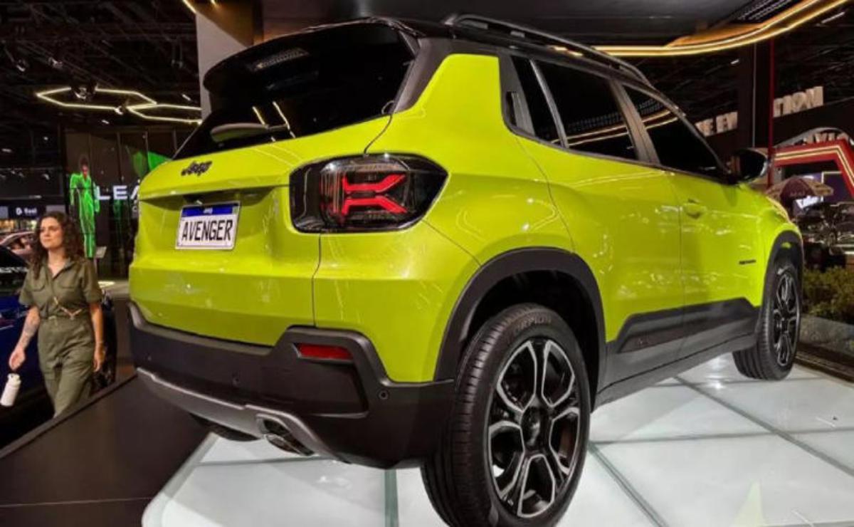 Rear view of a bright green Jeep SUV with modern design features.