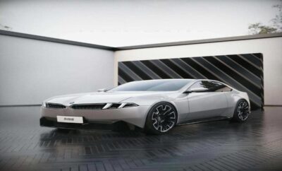 Sleek silver concept car with futuristic design and unique wheels.