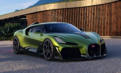 Sleek green Bugatti sports car parked on a street.