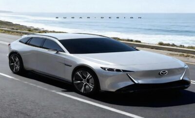 Sleek white luxury sedan parked by the ocean with waves in the background.