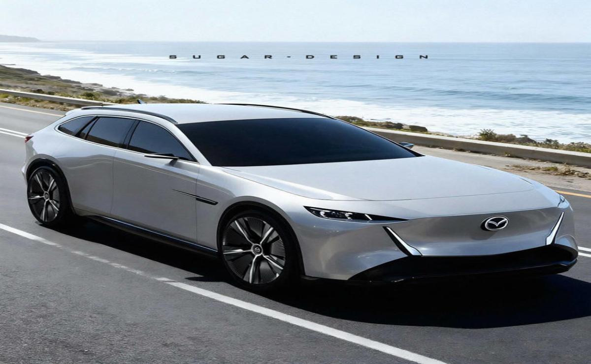 Sleek white luxury sedan parked by the ocean with waves in the background.