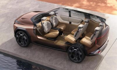 Futuristic brown SUV with open doors showcasing spacious interior seating.