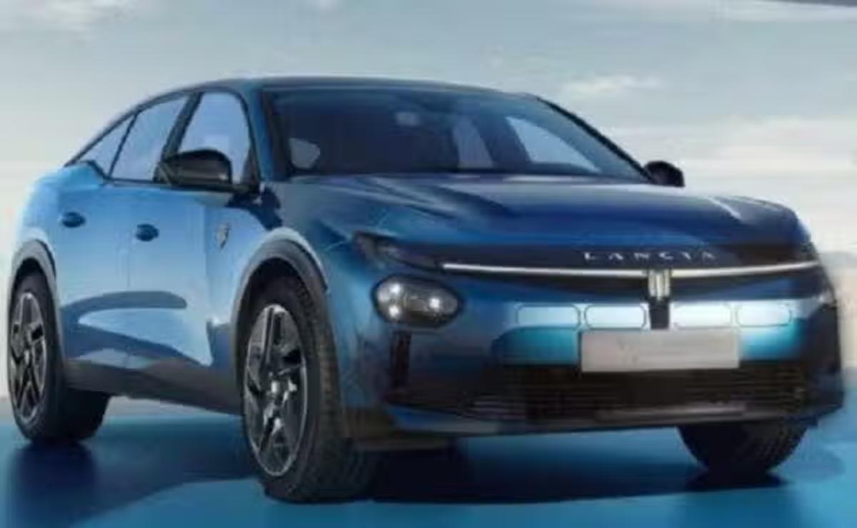 A sleek blue electric SUV parked outdoors on a clear day.