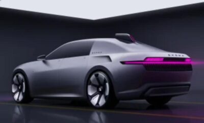 Sleek modern electric car with futuristic design and smooth curves.