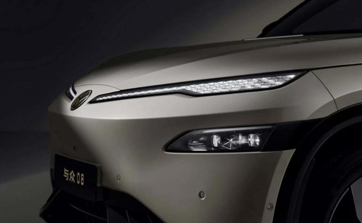 Close-up of a sleek car front with modern LED headlights.