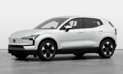 A sleek white electric SUV with modern design features.