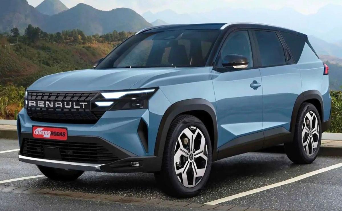 Blue Renault SUV parked on a road with mountains in the background.