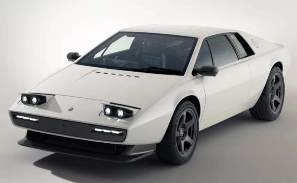A sleek white classic sports car with pop-up headlights and black accents.