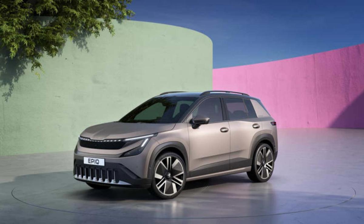 Modern electric SUV parked with colorful walls in the background.