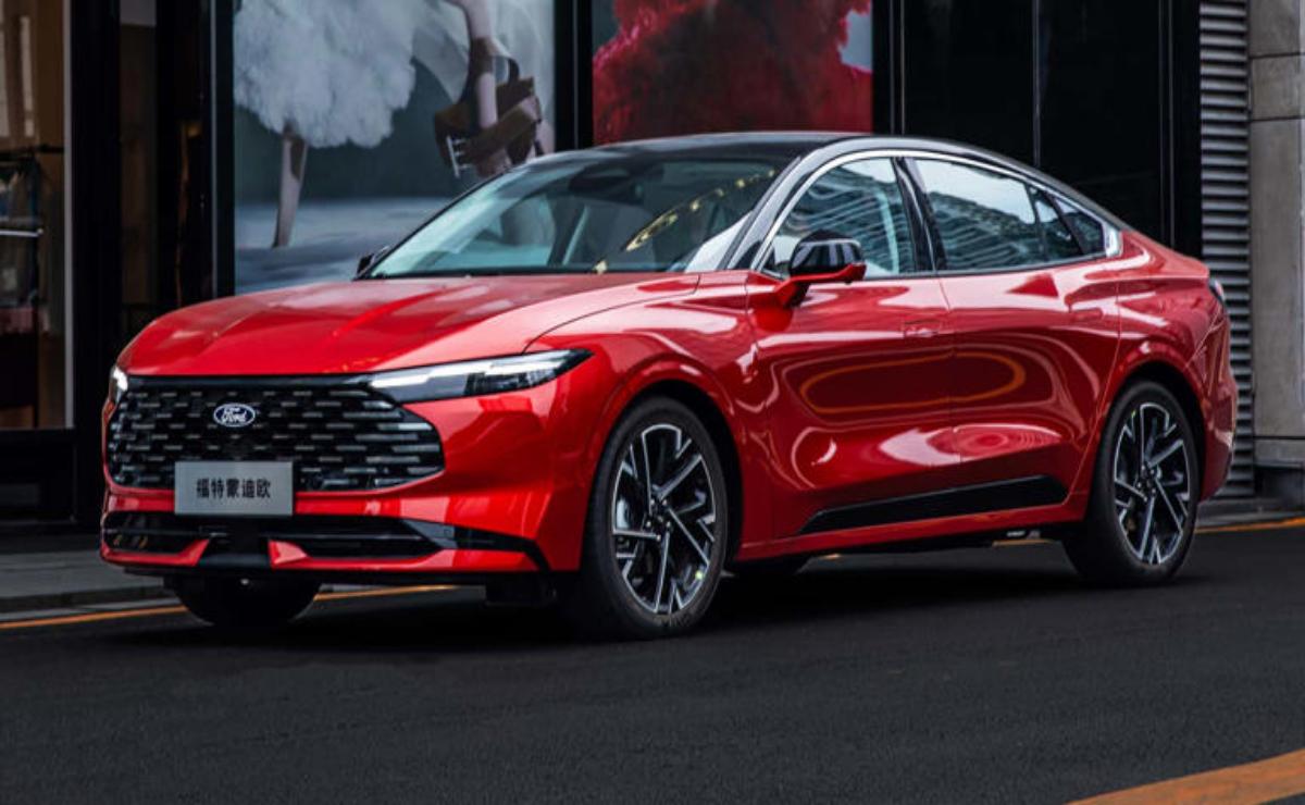 Sleek red modern sedan with stylish design and sharp headlights.