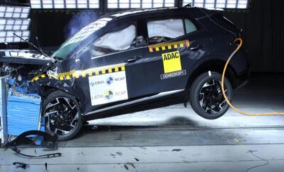 Car undergoing a crash test with impact sensors attached.