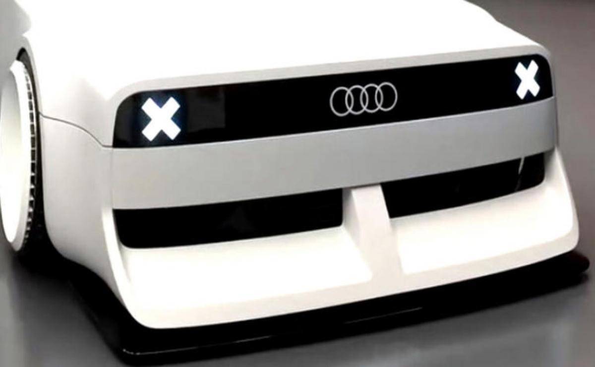 Close-up of a white Audi car grille with the logo and design details.