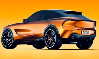 Sleek orange sports car with modern design and black rims.