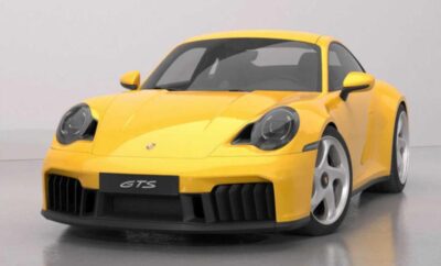 Yellow Porsche 911 GT3 sports car on display.