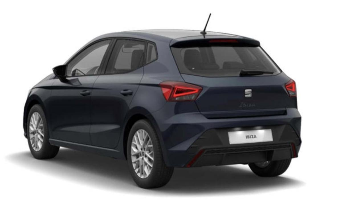 Dark blue SEAT hatchback car parked on white background.