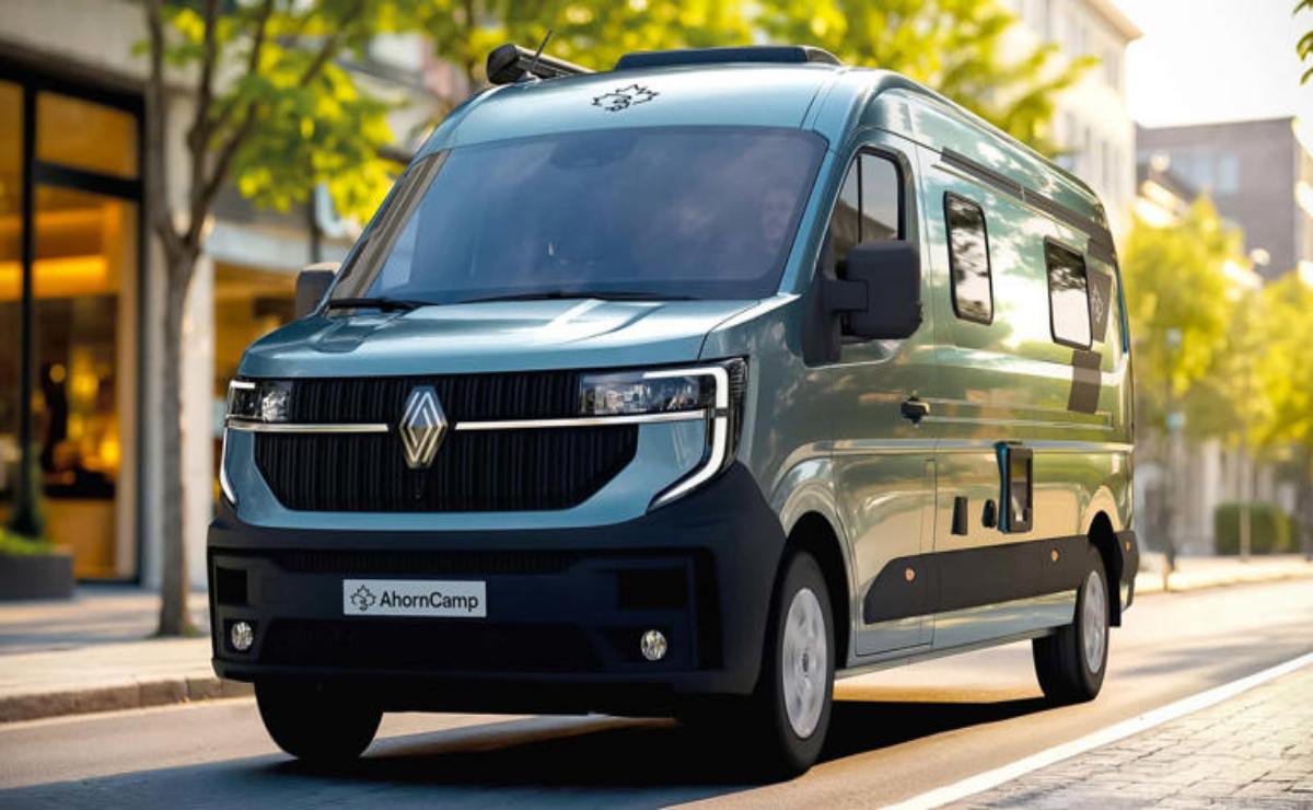 Modern black camper van parked outdoors with green trees in background.