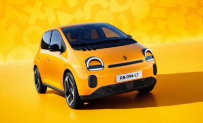 Bright yellow compact car with modern design on a yellow background.
