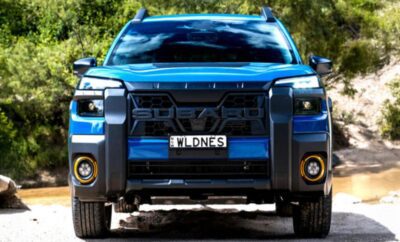 A bold black Ford truck with custom front grille and license plate.