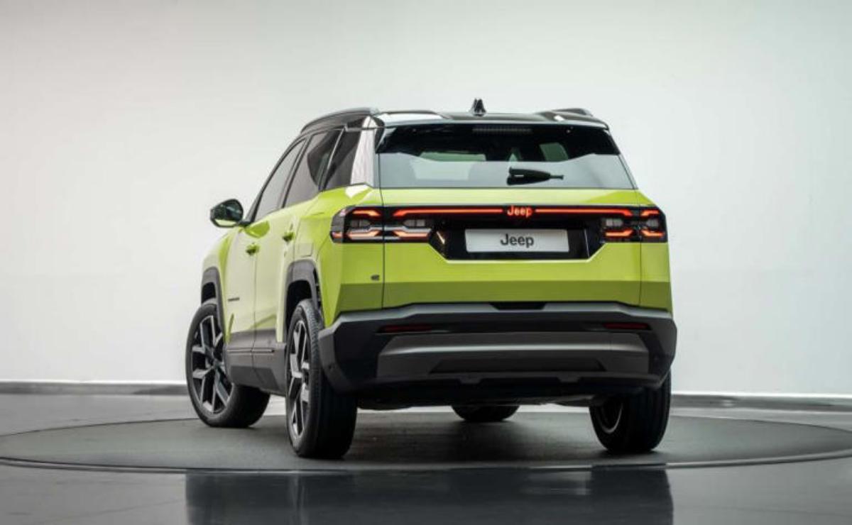 Rear view of a lime green SUV with modern taillights.