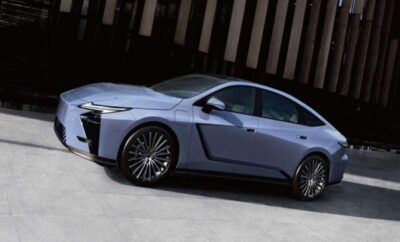 Sleek silver luxury sedan with modern design and unique front lights.
