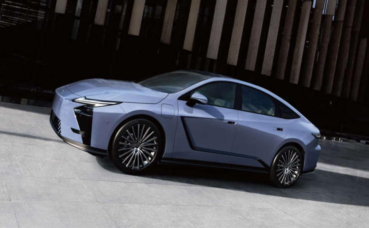 Sleek silver luxury sedan with modern design and unique front lights.