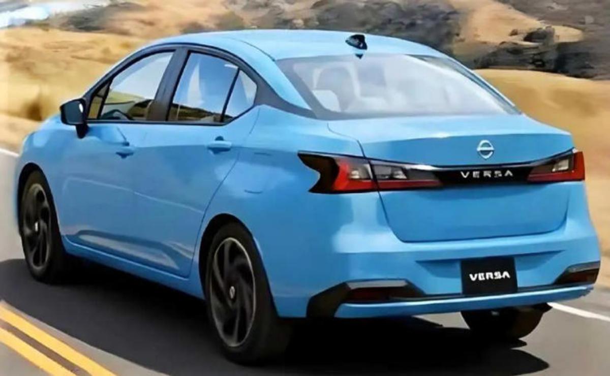 Rear view of a blue Nissan Versa sedan parked outdoors.