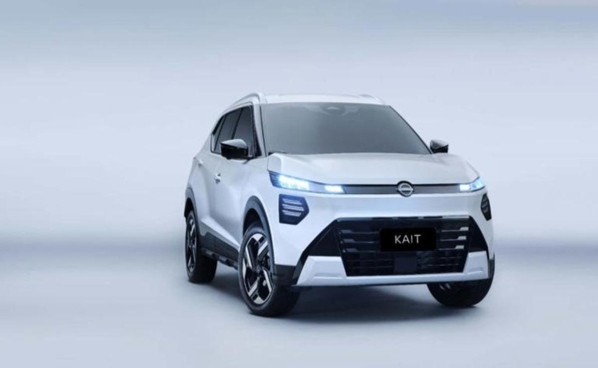 Sleek silver electric SUV parked on a plain background.