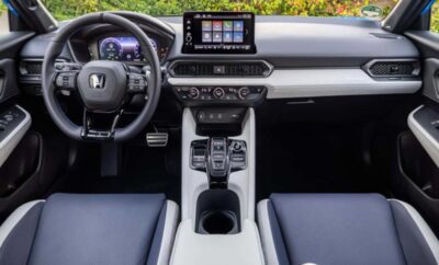 Modern car interior with digital dashboard and touchscreen display.