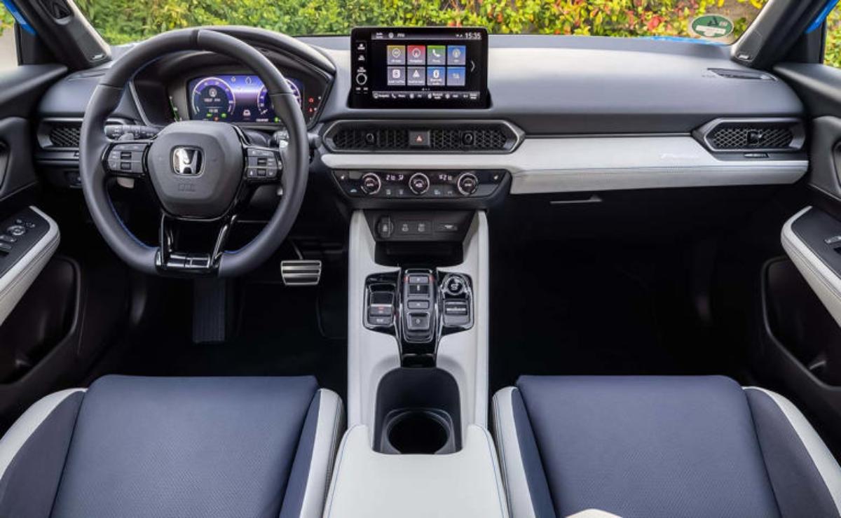Modern car interior with digital dashboard and touchscreen display.